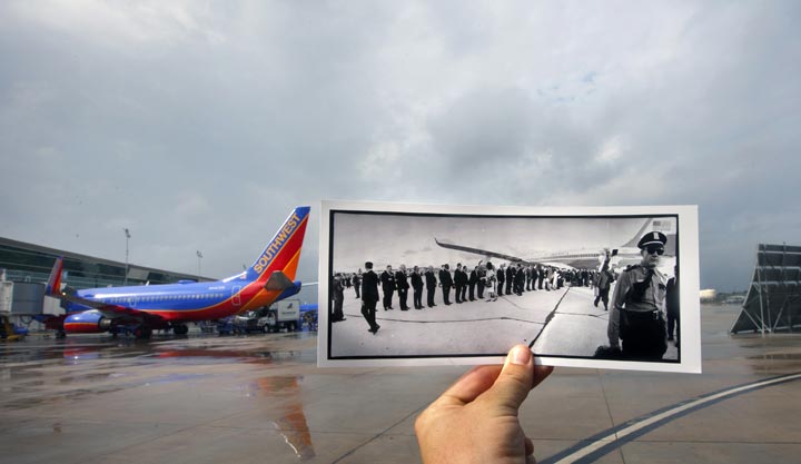 This Oct. 30, 2013 photo shows an image taken Nov. 21, 1963, of U.S. President John F. Kennedy shaking hands with 22 prominent Houstonians after he and first lady Jacqueline Kennedy arrived at Houston International Airport, juxtaposed against the current William P. Hobby Airport in Houston. Kennedy was assassinated the following day. The airport’s name was changed to William P. Hobby Airport in 1967 in honour of the Texas governor, and the current-day terminal was finished in 2003. The original location where Air Force One was parked in the original photo is no longer an open area; it is now a parking toll plaza. (AP Photo/Houston Chronicle, Cody Duty)
