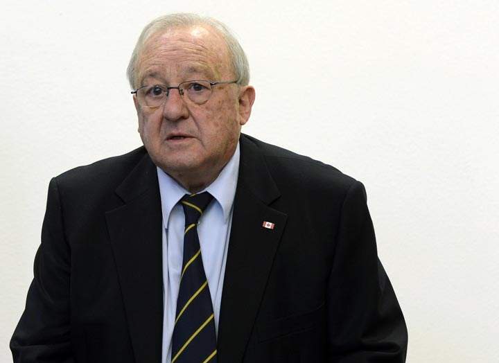 German-Canadian arms dealer Karlheinz Schreiber waits for the start of proceedings at the regional court in Augsburg, southern Germany, on February 26, 2013. 