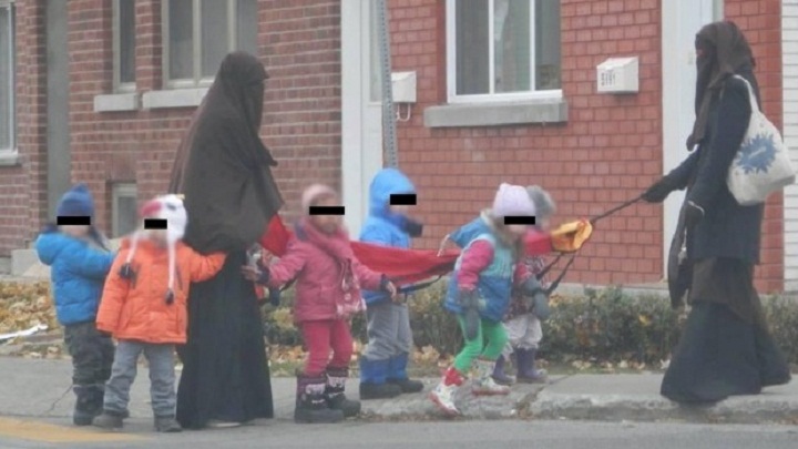 A photo showing two daycare workers walking with children in their care in Montreal has caused an uproar in Quebec.