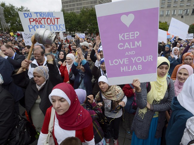 Demonstrators take part in a protest against Quebec's proposed Values Charter in Montreal on Sept. 14, 2013. 