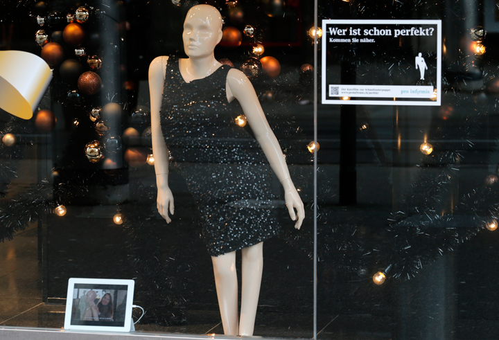 The “Because who is perfect? Get closer’ campaign captures the reaction of people as mannequins modeled after people with disabilities are displayed in store windows.