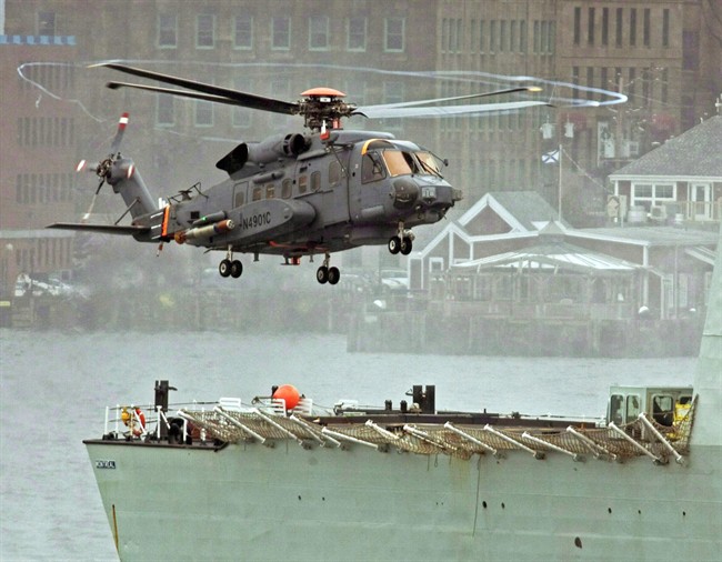 A Canadian military Sikorsky CH-148 Cyclone conducts test flights with HMCS Montreal in Halifax harbour on April 1, 2010. (Andrew Vaughan/The Canadian Press)