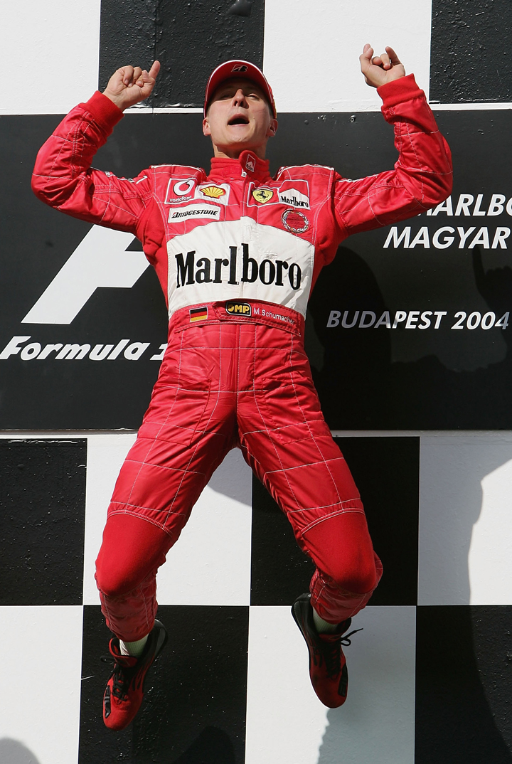 Michael Schumacher of Germany and Ferrari celebrates winning the Hungarian F1 Grand Prix at the Hungaroring Circuit on August 15, 2004, in Budapest, Hungary. (Photo credit: Getty Images).