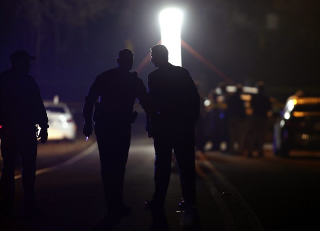Police investigate a shooting near Wingate University on Wednesday, Dec. 4, 2013, in Wingate, N.C. 