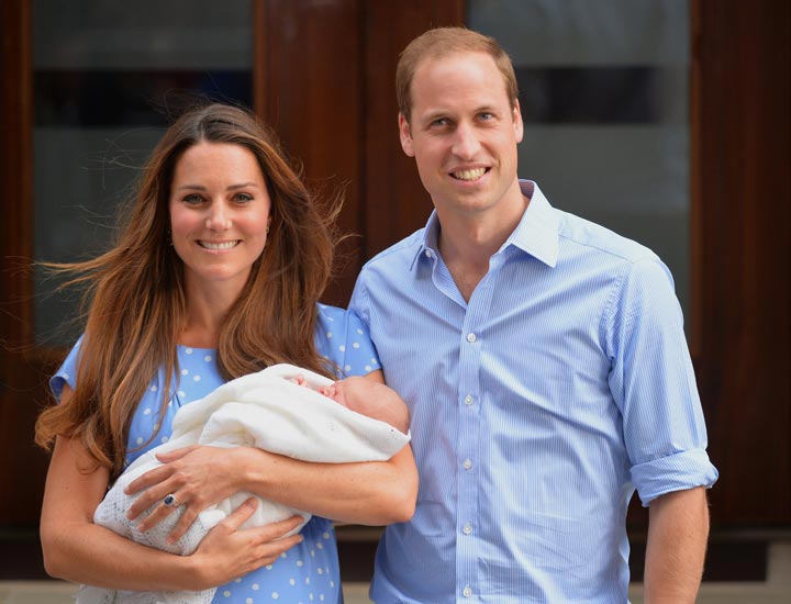 Prince William and Catherine, Duchess of Cambridge show Prince George to the world’s media in London. (Leon Neal/AFP/Getty Images)