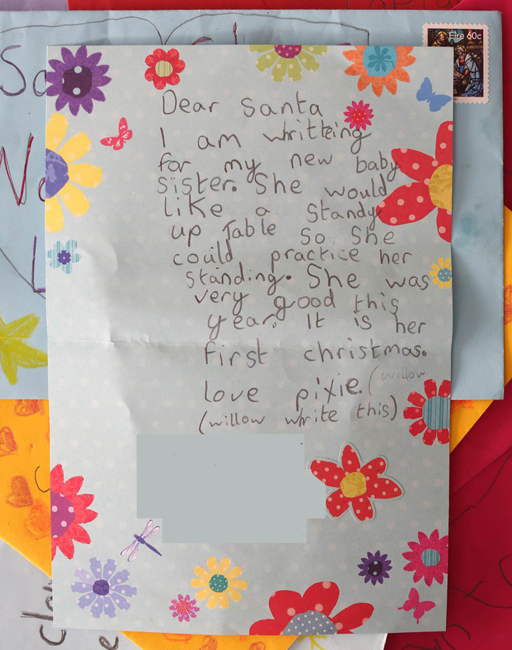 I am writing for my new baby sister. She would like a standing up table so she can practice her standing. She was very good this year. It is her first Christmas. Love, Pixie (Willow write this).”