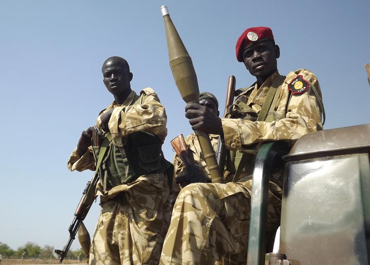 This picture taken on December 25, 2013 shows South Sudanese troops loyal to President Salva Kiir pictured at Bor airport after they re-captured it from rebel forces. 