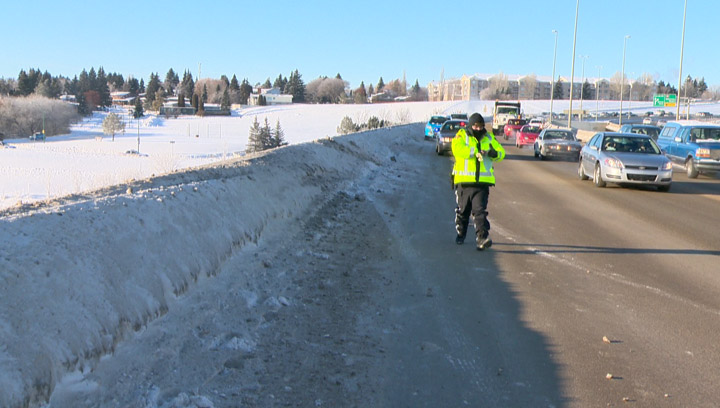 Vehicle goes over Circle Drive North Bridge into the South Saskatchewan River Monday afternoon.
