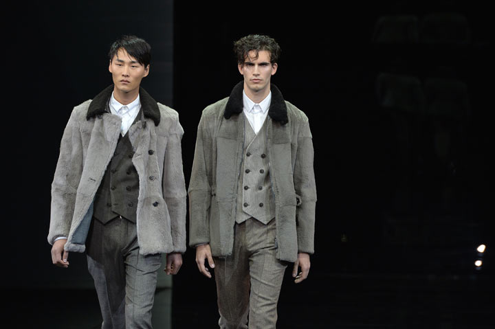 Models present creations for fashion house Giorgio Armani as part of Autumn/Winter 2014 Milan Collections during the Men’s fashion week on January 14, 2014 in Milan. (Photo by ANDREAS SOLARO/AFP/Getty Images)