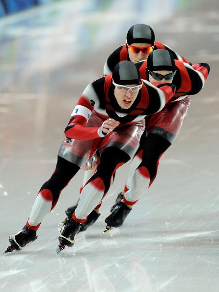 Team Canada with Mathieu Giroux, Lucas Makowsky and Denny Morrison compete on their way to winning the gold medal in the speed skating men's team pursuit finals on day 16 of the 2010 Vancouver Winter Olympics at Richmond Olympic Oval on February 27, 2010 in Vancouver.