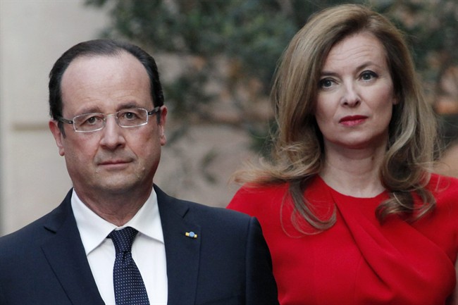 In this Tuesday, May. 7, 2013, file photo, French President Francois Hollande, left, and his companion Valerie Trierweiler arrive for a state dinner at the Elysee Palace, in Paris as part of Polish President Bronislaw Komorowski's two-day visit to France. 