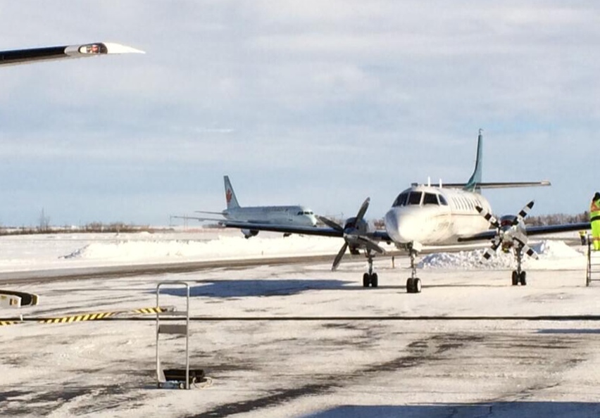 Diverted aircraft at Brandon’s airport Wednesday, Jan. 15, 2014, including an Air Canada Airbus in the background