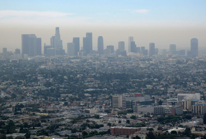 Dense smog hovers of the Los Angeles skyline in 2009. The state of California has committed itself to significantly reducing pollution levels.