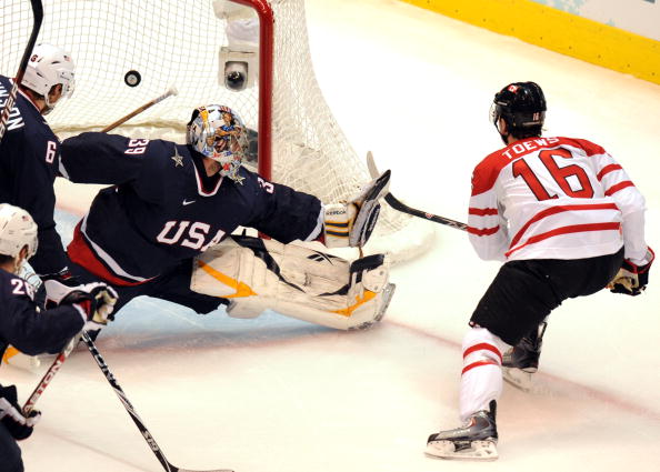 Canadian forward Jonathan Toews (16) scores Canada's first goal during the Men's Gold Medal Hockey match between USA and Canada at the Canada Hockey Place during the XXI Winter Olympic Games in Vancouver, Canada on February 28, 2010.