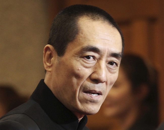 FILE - In this Tuesday, Oct. 30, 2012 file photo, Chinese director Zhang Yimou arrives to attend Daejong Film Festival in Seoul, South Korea. Zhang must pay more than $1.2 million in fines for having three children in violation of China's strict family planning rules, officials said Thursday, Jan. 9, 2014. 