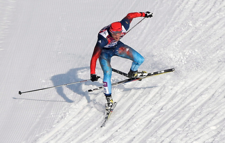 Russia’s Anton Gafarov falls with a broken ski during his men’s semifinal of the cross-country sprint at the 2014 Winter Olympics, Tuesday, Feb. 11, 2014, in Krasnaya Polyana, Russia.