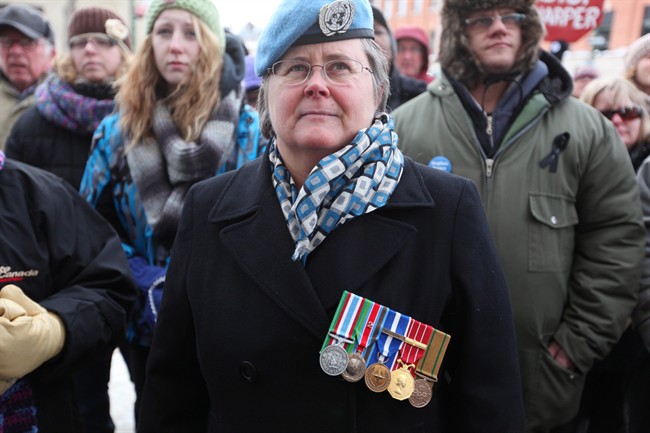Ret. Sergeant Major Rene Bell gathers with other veterans at a Veterans Affairs Office in Brandon, Manitoba, on Friday, January 31, 2014. 