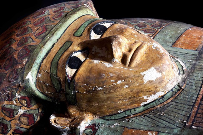 This photo released on Thursday, Feb. 13, 2014 by Egypt's Supreme Council of Antiquities, shows a preserved wooden sarcophagus that dates back to 1600 BC, when the Pharaonic 17th Dynasty reigned, in Egypt.
