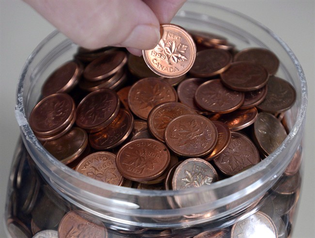 A household penny jar is shown in Montreal, Monday, February 4, 2013. 