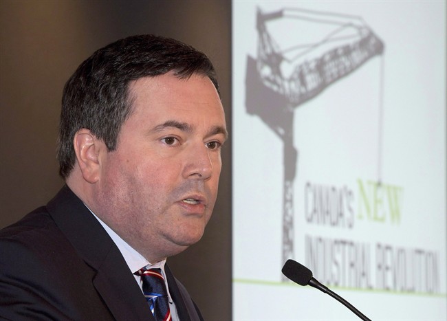Employment Minister Jason Kenney speaks in Toronto on January 23, 2014. 