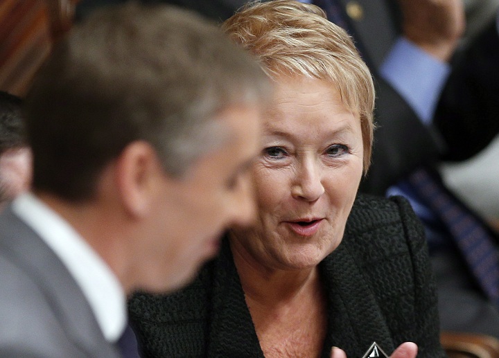 Quebec Finance Minister Nicolas Marceau is applauded by Premier Pauline Marois as he tables his budget Tuesday, November 20, 2012 at the legislature in Quebec City.