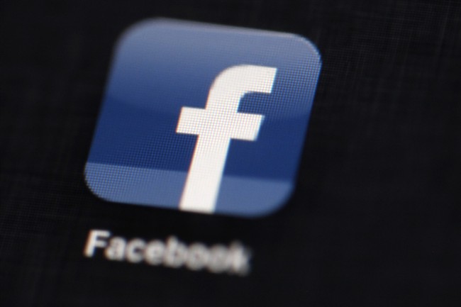 This May 16, 2012 file photo shows the Facebook logo displayed on an iPad.