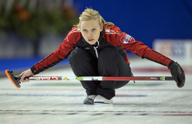 Ontario skip Allison Flaxey keeps an eye on her rock Monday in Montreal.