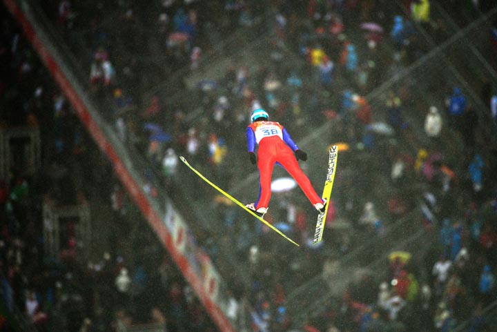 Norway’s Joergen Graabak competes during the Nordic Combined Individual 10 km Ski Jumping competition at the RusSki Gorki Jumping Center during the Sochi Winter Olympics on February 18, 2014. (John MacDougall/AFP/Getty Images)
