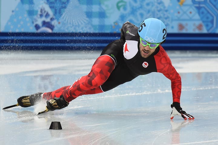 Canada’s Charles Hamelin competes in the Men’s Short Track 500 m Heat 8 at the Iceberg Skating Palace during the Sochi Winter Olympics on February 18, 2014. (Damien Meyer/AFP/Getty Images)