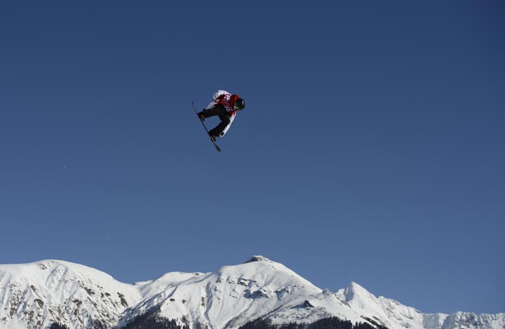 Canada’s Maxence Parrot competes in the Men’s Snowboard Slopestyle qualifications at the Rosa Khutor Extreme Park during the Sochi Winter Olympics on February 6, 2014. (Franck Fife/AFP/Getty Images)