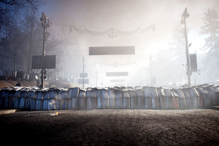 Anti-government protesters clash with riot police in Kyiv, Ukraine on Feb. 18. 2014. / (Photo credit: Emeric Fohlen/AP Photo)