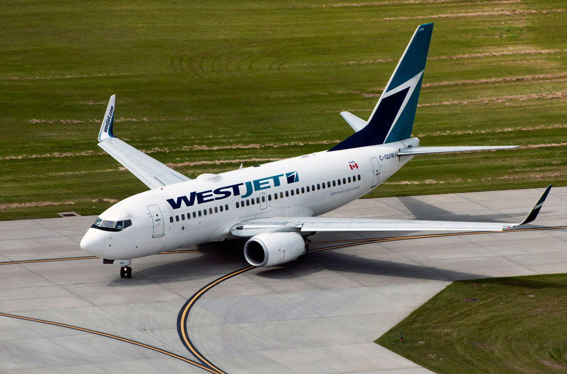 WestJet made more profit than expected in the last three-month stretch, and is rewarding investors with a dividend hike.