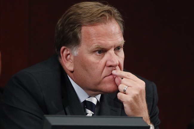 FILE - In this June 18, 2013, file photo, House Intelligence Committee Chairman Rep. Mike Rogers, R-Mich. listens to testimony on Capitol Hill in Washington, Tuesday, June 18, 2013, by National Security Agency Gen. Keith B. Alexander.