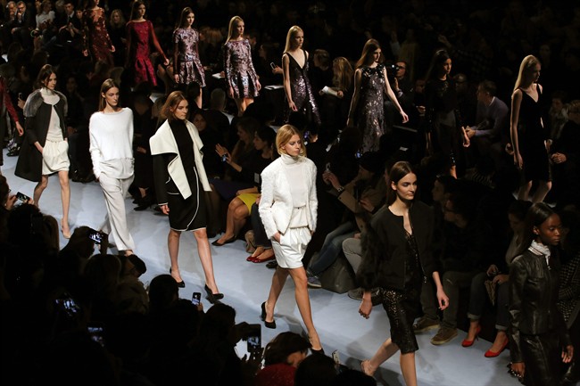 Models wear creations for Nina Ricci\’s ready-to-wear fall/winter 2014-2015 fashion collection presented in Paris, Thursday, Feb. 27, 2014.
