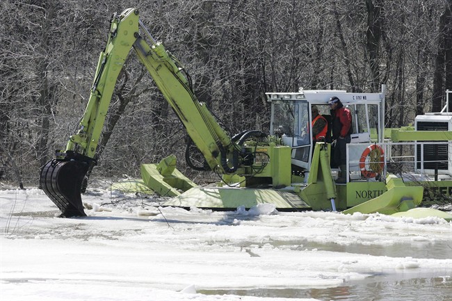 The ice cutters now have front pedals to better support the hydraulic boom arms, which pulls the Amphibex onto solid ice.