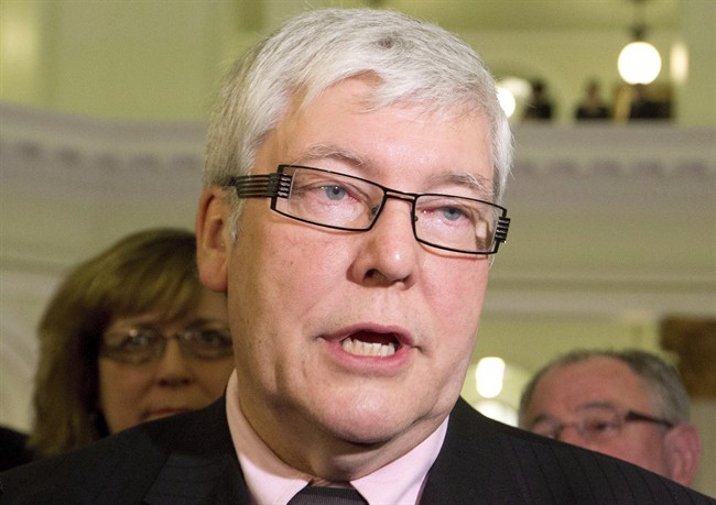Dave Hancock speaks in Edmonton, on Thursday March 20, 2014. THE CANADIAN PRESS/Jason Franson.
