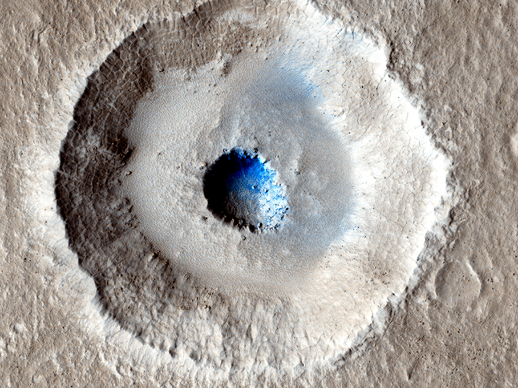 Bullseye. Though most impact craters are bowl-shaped, this crater is more unusual, as it has a wide, flat bench between its outer rim and inner section.