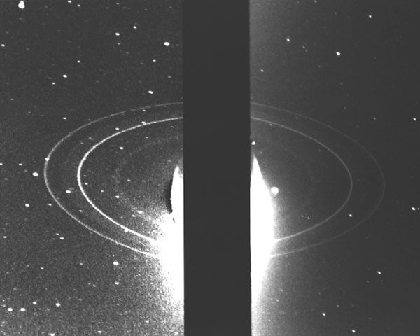 Due to the long-exposure needed to expose Neptune’s rings, the planet is covered in this Voyager 2 image.