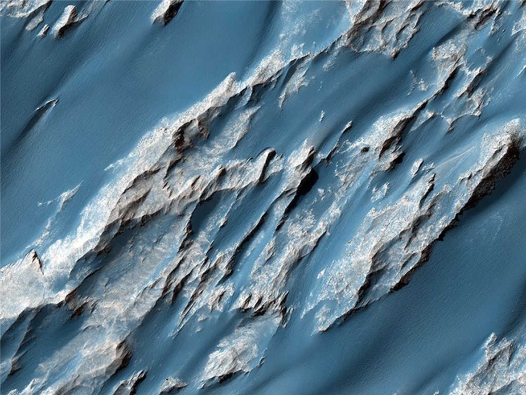 Ancient landslides. This image shows an approximately 3-billion year-old landslide in Ophir Chasma.