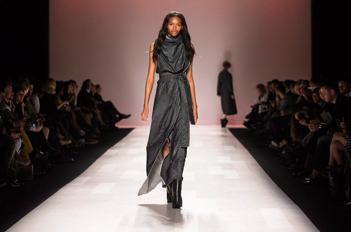 A model walks the runway in the Sid Neigum show during Toronto Fashion Week in Toronto, Tuesday October 22, 2013. 