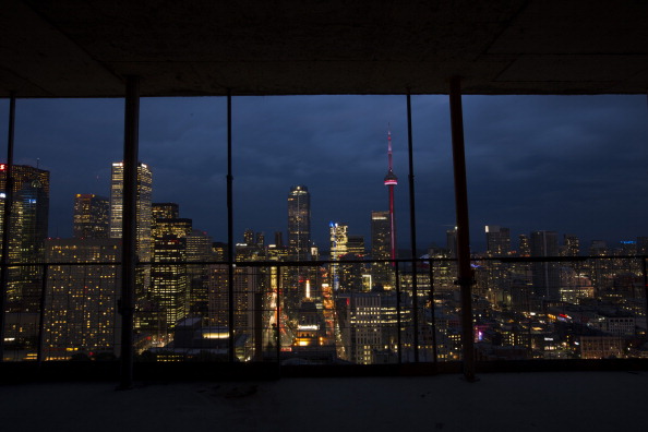A condominium under construction looks out over Toronto. New construction on condos in the city fell last month compared to a year earlier.