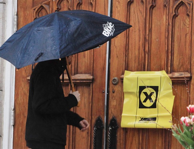A voter enters a polling station for the federal election, May 2, 2011 in Ottawa.