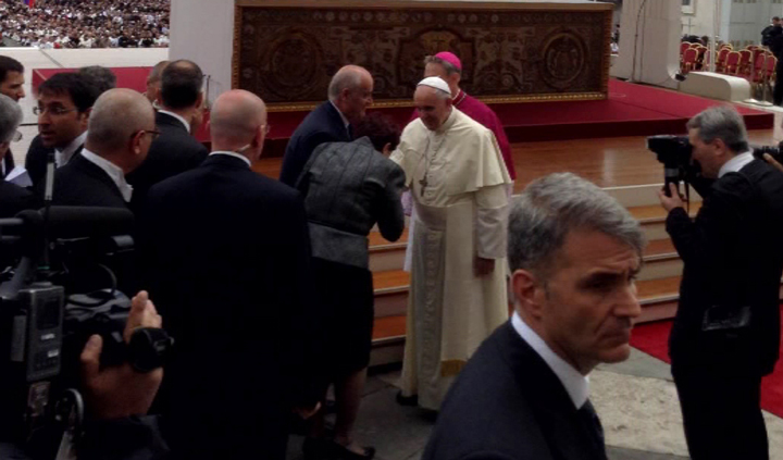 Veteran Affairs Minister Julian Fantino and his wife greet Pope Francis in Rome’s St. Peter’s Square on April 27, 2014.