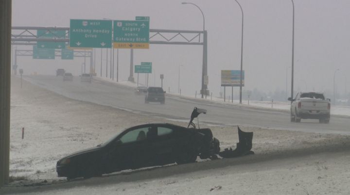 A car hit the ditch off Anthony Henday Drive, near 91 Street, in south Edmonton Friday, April 18, 2014.