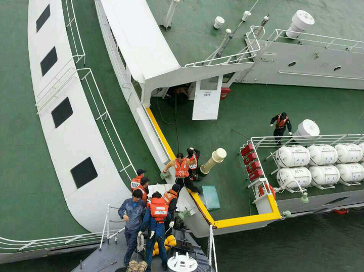 In this handout image provided by the Republic of Korea Coast Guard, passengers are rescued by the Republic of Korea Coast Guard.