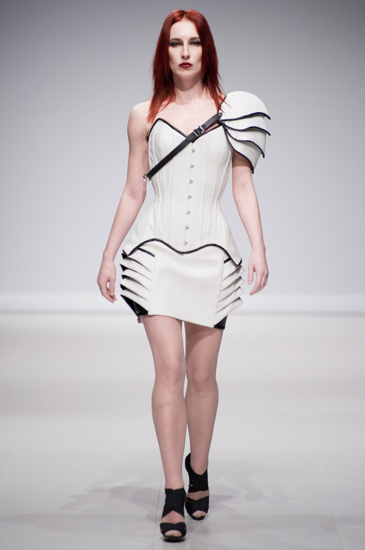 Tues. April 22, 2014: Starkers Corsetry sent a troop of models down the FAT 2014 runway, outfitted in wares with a decidedly tech-minded edge.