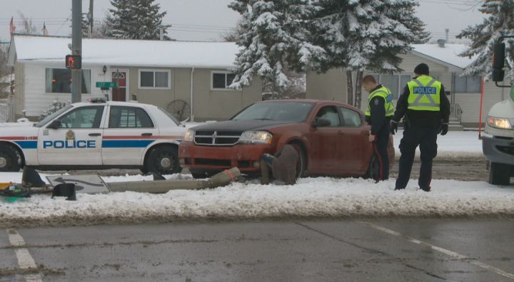 A car slammed into a light standard in the area of 137 Avenue and 68 Street Friday, April 18, 2014.