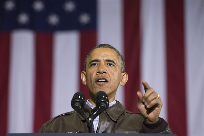 President Barack Obama gestures while speaking to troops at Bagram Air Field north of Kabul, Afghanistan, during an unannounced visit, on Sunday, May 25, 2014. 