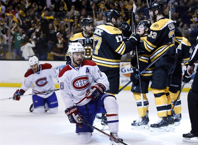 Montreal Canadiens defensemen Josh Gorges and Mike Weaver.