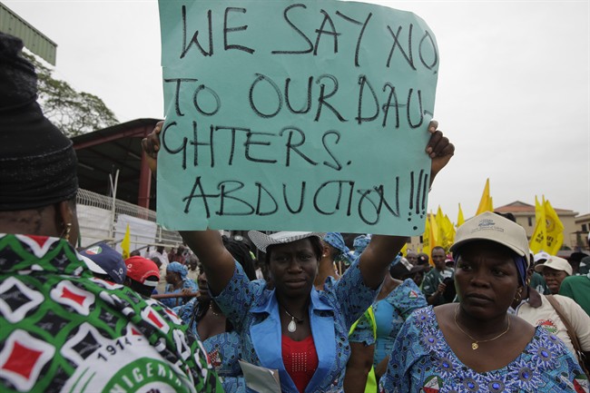Hundreds of schoolgirls were abducted by the Nigerian Islamic insurgent group Boko Haram and are to be sold as "slaves," the group's leader said.